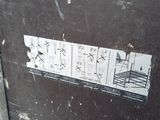 a sticker on the door of a building that has a picture of a train on it