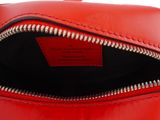 the inside of a red purse with a zipper on it