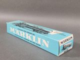 an image of a box of markin toothpaste sitting on a table