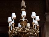 a chandelier hanging from the ceiling of a building