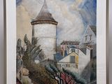 l'image d'un tableau accroché à un chevalet en bois