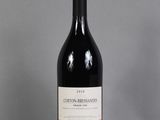 a bottle of wine that is sitting on a table