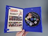 someone is holding a blue case with a video game inside of it