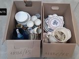 two boxes with items in them sitting on the floor
