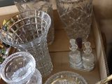 a box that has a lot of glass items in it
