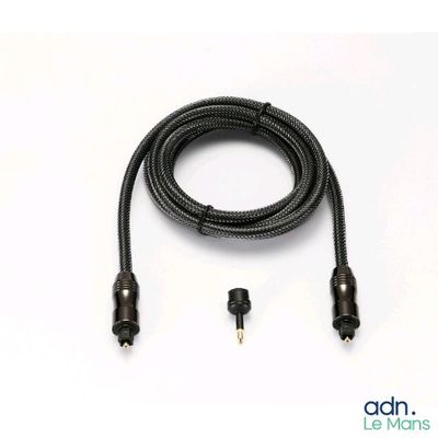 a close up of a black cable connected to a white background