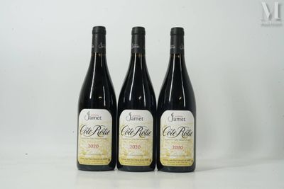 three bottles of wine are sitting on a white surface
