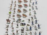 a lot of figurines that are on the table