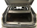 the back of a car with its trunk open showing the cargo compartment