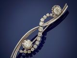 a diamond broochle, by cartier