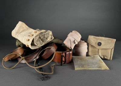an image of a group of leather items sitting on top of a table