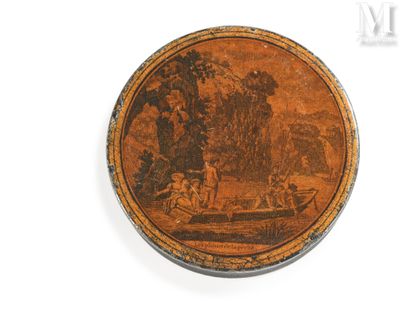 an old picture of a wooden box with a picture of a man in a boat