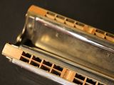 a close up of a harmonica on a table