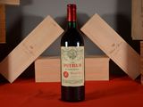 a bottle of wine that is sitting on a table