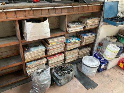 a lot of books on the shelves in the room