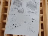 a picture of a picture of a baby crib with instructions on it