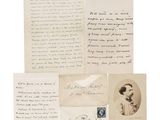a group of old letters and papers with a picture of a man