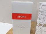 a box of sport next to a box of perfume on a table
