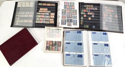 a lot of stamps and a book on a table