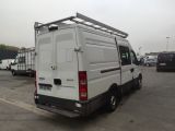 a white van that is parked in a parking lot