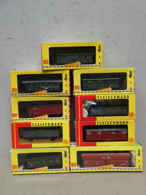 five boxes of train cars stacked on top of each other