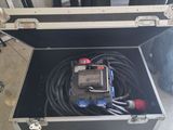 an open case with tools inside of it on the floor