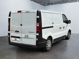 a white van that is parked in a room