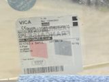 a picture of a bus ticket with a bus in the background