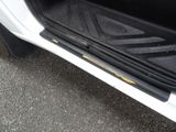 a close up of a car door with the door handle open