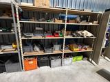 a room that has a lot of shelves and bins in it
