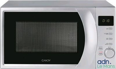 an image of a microwave oven with the door open