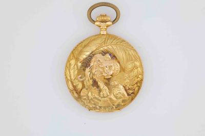 a picture of a gold locke with a woman ' s face on it