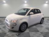 a picture of a white smart car in a showroom