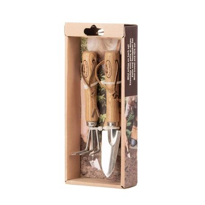 une boîte en bois contenant deux outils de jardinage