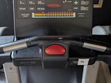 a picture of a tread machine with a digital clock on it