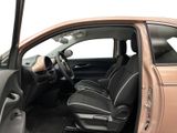 the interior of a car with the door open and the driver ' s seat up