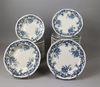 six blue and white plates stacked on top of each other