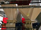 a machine that is working on a machine in a factory