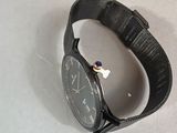a watch that is sitting on a table