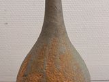 a small vase that is sitting on a table