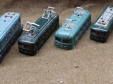a lot of toy trucks that are lined up together