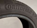 a close up of a tire with the word continental written on it