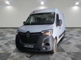 a white van that is parked on a checkered floor