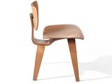 a wooden chair with a wooden seat on a white background