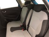 the back seats of a car with a black seat belt