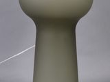 an image of a table lamp that is on a table