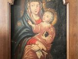 a painting of a woman holding a child in her arms