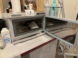 a toaster oven sitting on a table in a kitchen