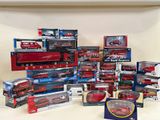 a lot of toy vehicles and other toys on the table