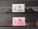 deux timbres avec la photo d'un homme et d'une femme